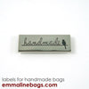 Metal Bag Labels "Handmade" with bird in 4 finishes by Emmaline Bags